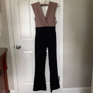 NWT Free People Size Small black/Khaki color jumpsuit retail $128 🖤